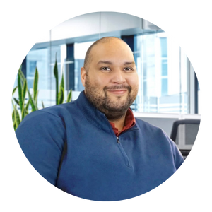 man in blue jumper headshot